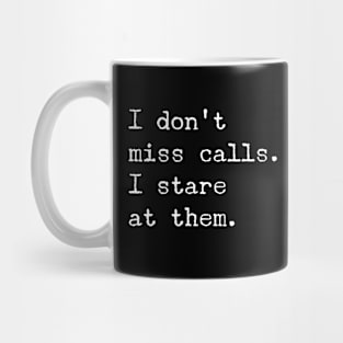 I don't miss calls. I stare at them. Mug